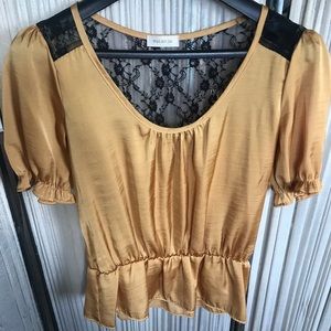 Gold and black shirt